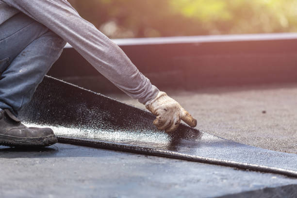 Professional Exterior Waterproofing technician working in Brockport, NY